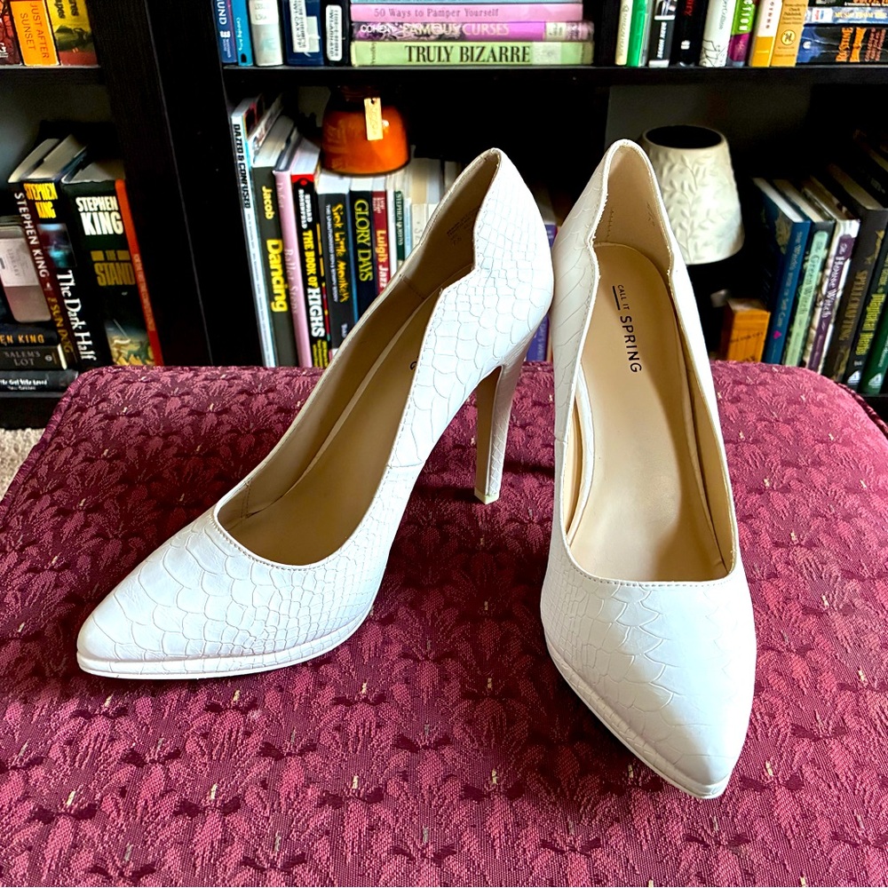 Call it spring white snakeskin pumps